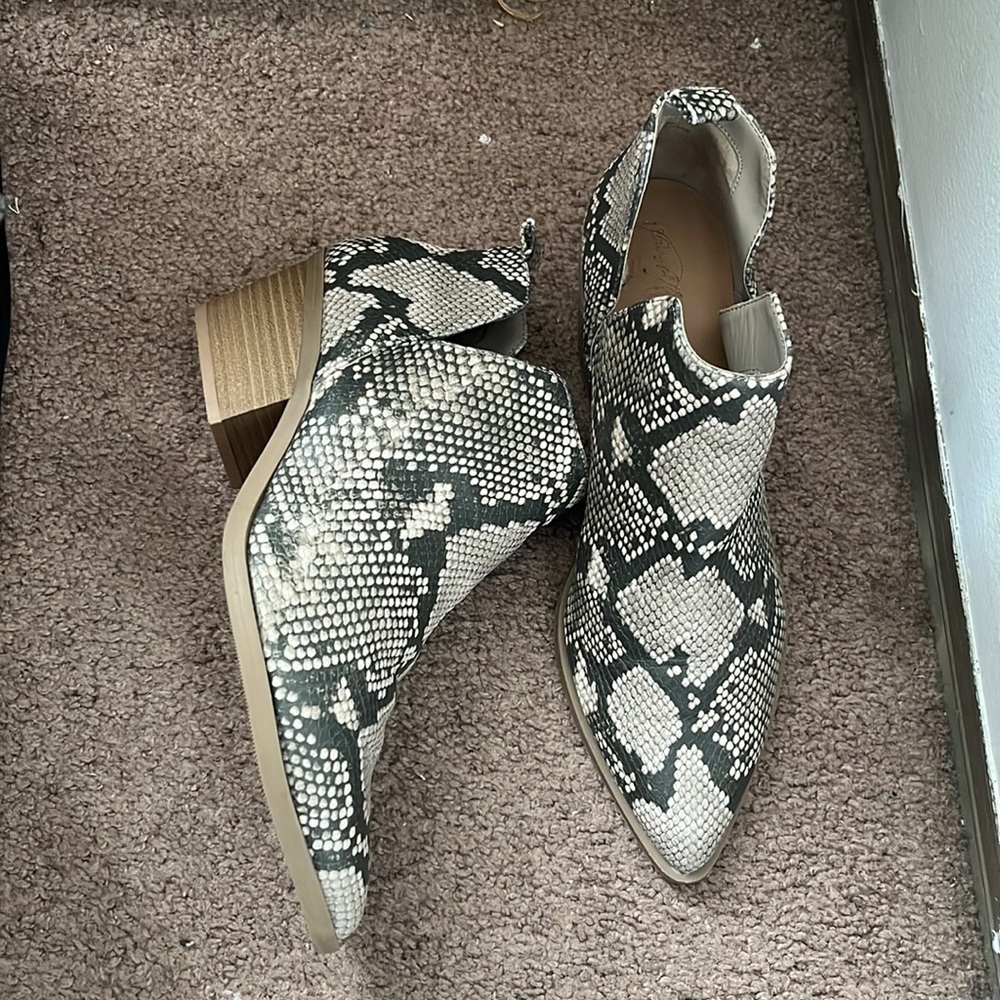Snake ankle boots.